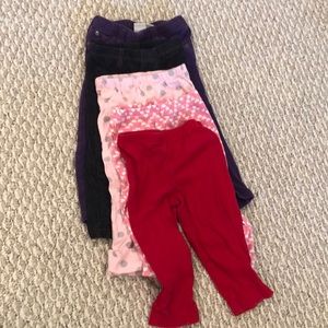 4 pairs of 12 mo pants, 1 pair 18 mo pants